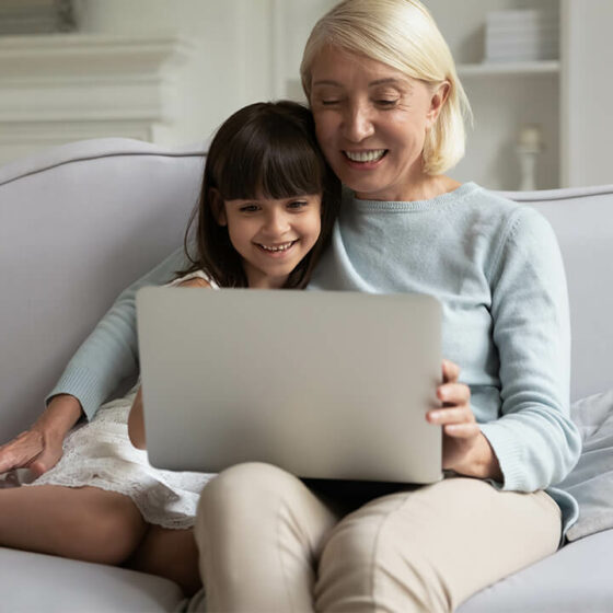 lifestyle image; woman and child, on laptop